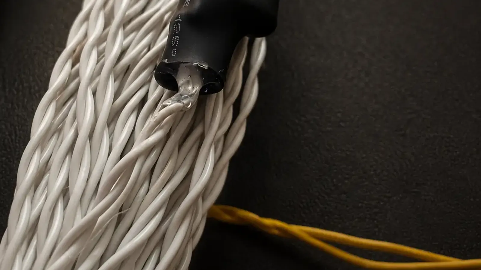 Close-up of the sealed waterproof joint on a series light wire
