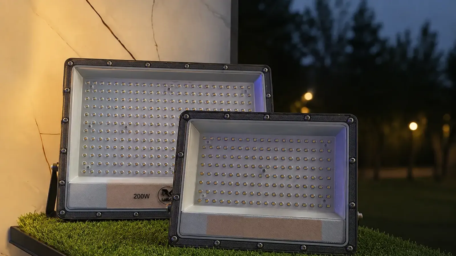 A pair of LED flood lights of the kind mounted on the corner poles of a garba ground